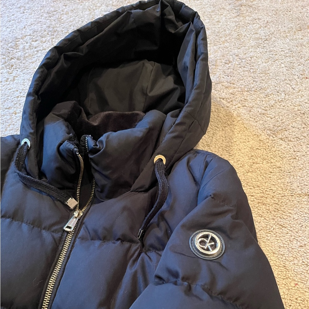Calvin Klein woman’s jacket in black. In excellent condition. Size petite large